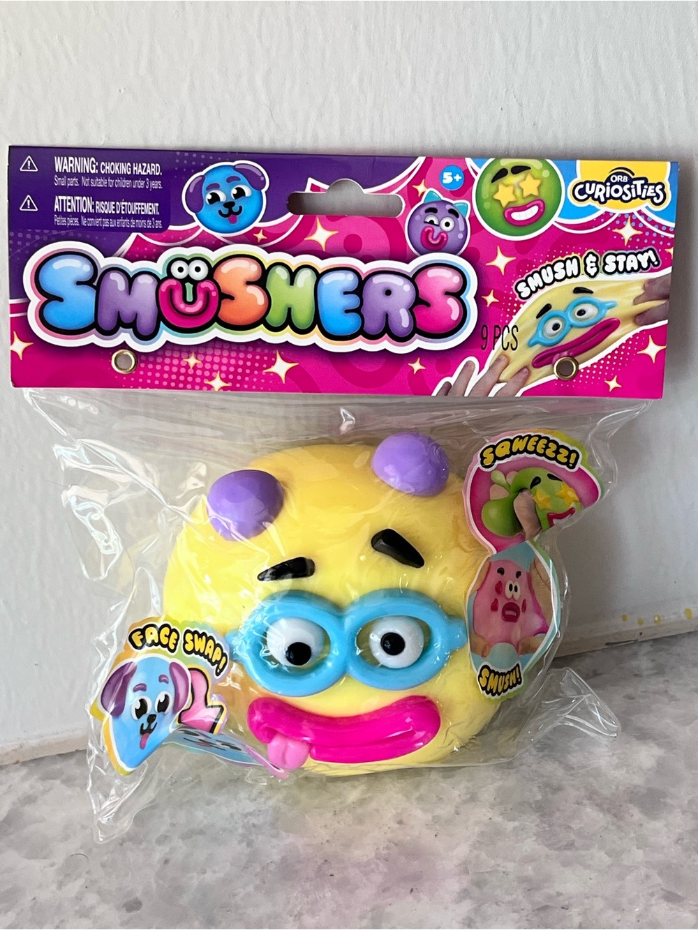 SMUSHERS  Yellow Face Squishy Toy